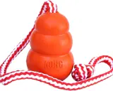 En orange Kong-leksak med rep, perfekt för lek och träning. Inte en kong frisbee, men lika rolig för hunden!
